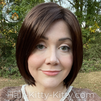 The Suri Wig in the color  Ginger Snap, modelled by Heather, front view