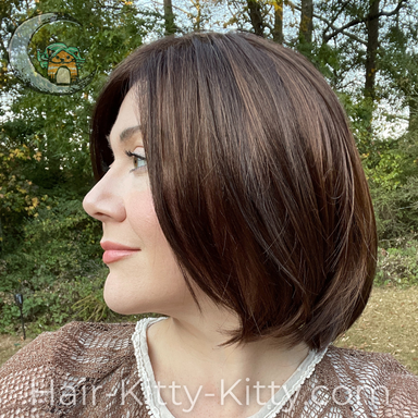 The Suri Wig in the color Ginger Snap, modelled by Heather, left side view