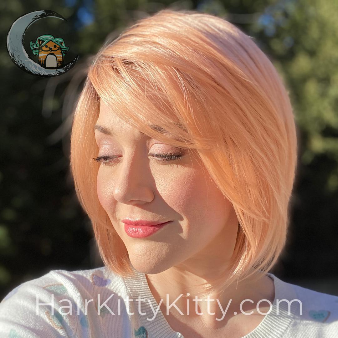 Ainsley Wig - Peach Bellini Rooted-Machine Made Wefted Wig-CysterWigs Limited-Peach Bellini Rooted-Ainsley | Peach Bellini Rooted | CysterWigs Limited HF Full Wig-2021, Ainsley, All, Average, Bob, Crown Filler, CWL, Eligible, Fashion, Fringe: 7", Glam, Has Permatease, Heart + Inverted Triangle, Heat-Friendly Synthetic, Nape 3 - 4", Oval + Diamond, Overall Length: 13", Peach Bellini Rooted, Round, Shag, Square, Standard Wig, Straight, Triangle + Pear, warm, Weight: 4 oz, Wigs, zodiac-aquarius, zo