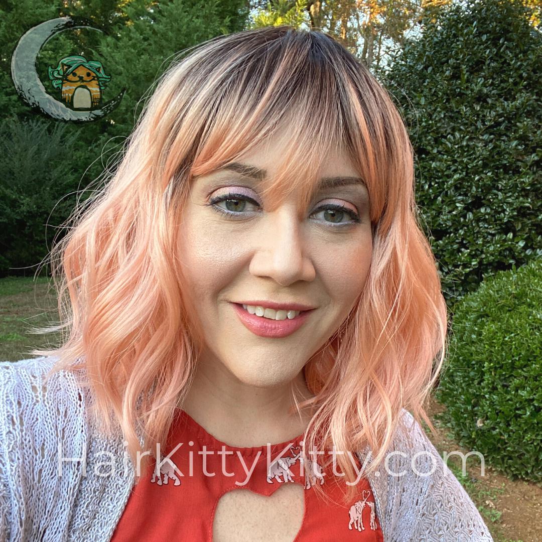 Ambrose Wig - Peach Bellini Rooted-Machine Made Wefted Wig-CysterWigs Limited-Peach Bellini Rooted-Ambrose | Peach Bellini Rooted | CysterWigs Limited HF Full Wig-2019, 2B, All, Ambrose, Average, Bob, CWL, Fashion, Fringe, Fringe: 4", Heart + Inverted Triangle, Heat-Friendly Synthetic, Nape 4 - 6", No Permatease, Oval + Diamond, Overall Length: 14", Peach Bellini Rooted, Round, Square, Standard Wig, warm, Wavy, Weight: 2.5 oz, Wigs, zodiac-aquarius, zodiac-aries, zodiac-libra-HairKittyKitty